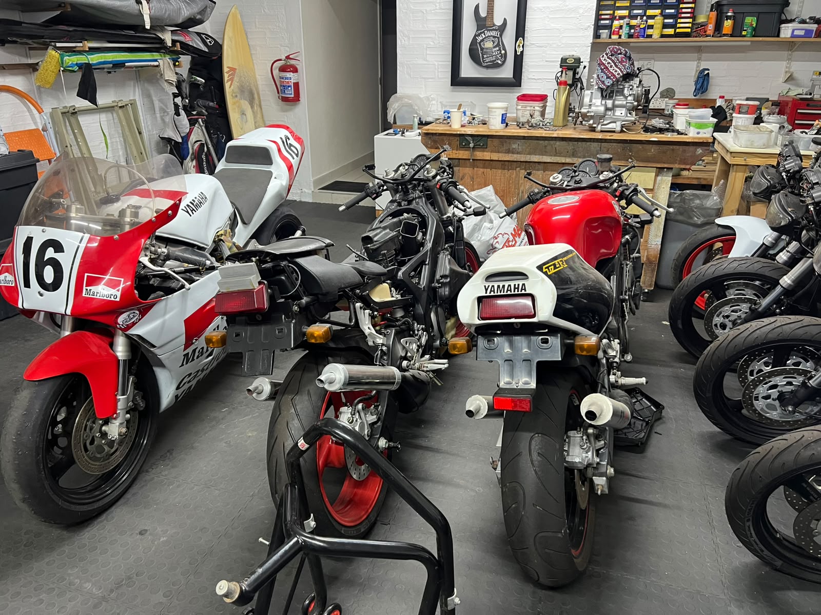 Two-stroke projects lined up in the workshop