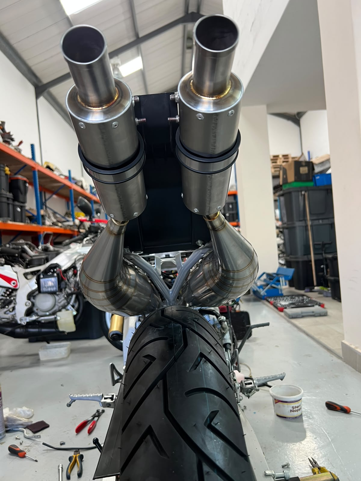 TYGA stainless race exhausts on a TZR250 3MA1 in the workshop