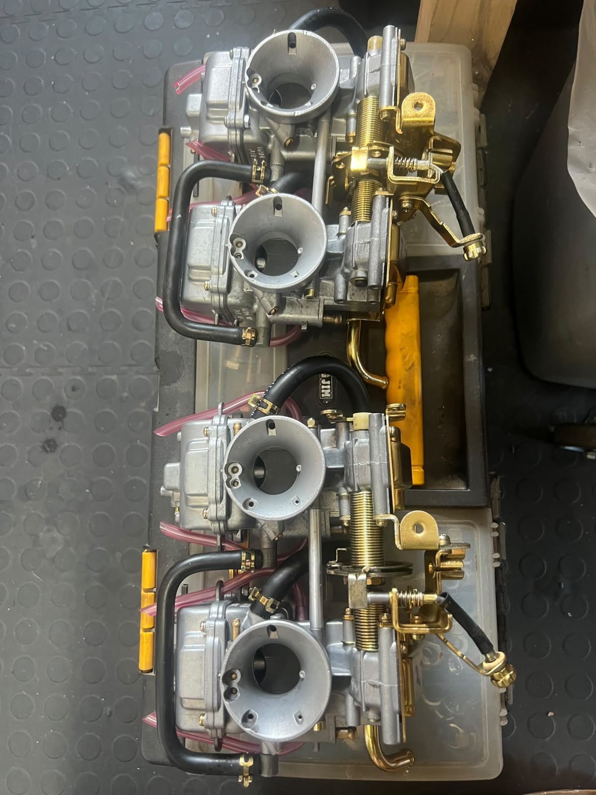 Four rebuilt carburettors ready to fit