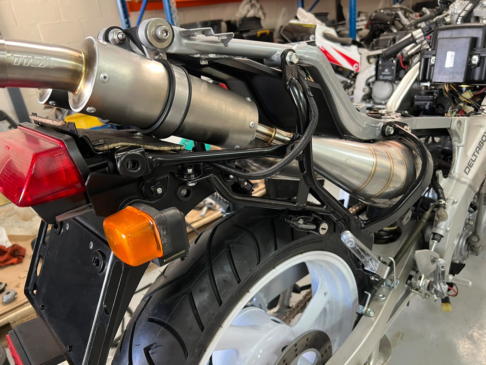Rear of a two-stroke with TYGA exhaust and tidy wiring